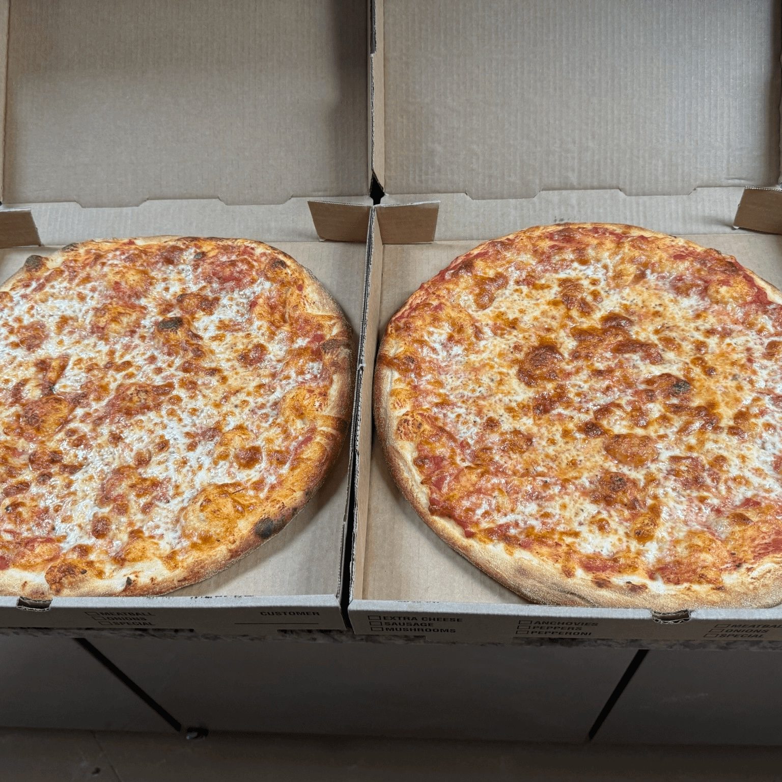 2 XL 18' Cheese Pizzas.