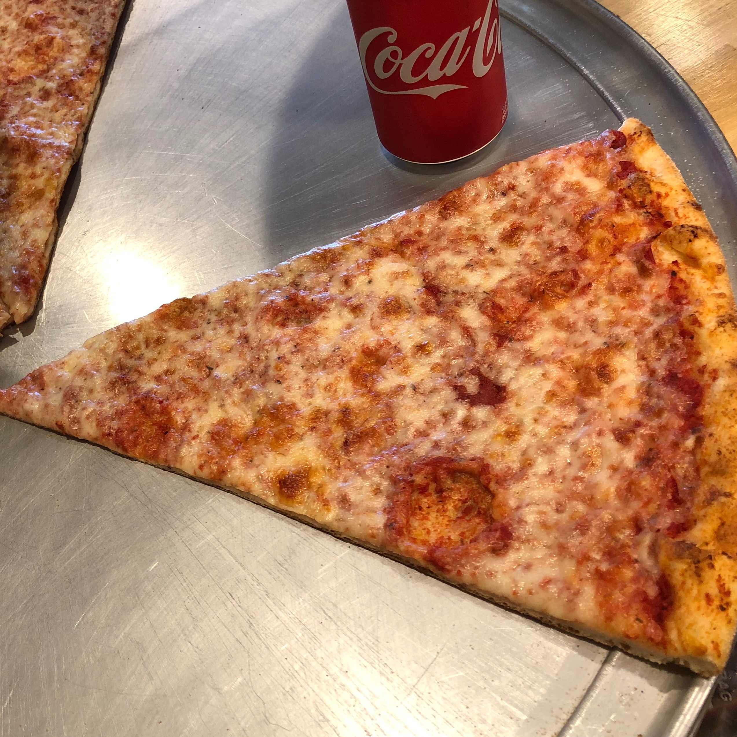 Pizza by the Slice (Select specific slice for price).